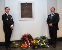 Image caption: Historian Dale Chatwin and John Wadsley (Maritime Museum of Tasmania) with the memorial plaque in Anzac Square, Brisbane. Image courtesy of 52nd Battalion AIF Facebook Group.